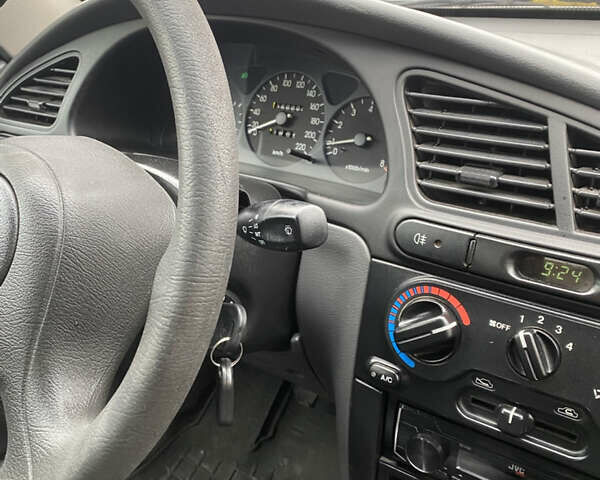 Зелений Деу Ланос, об'ємом двигуна 1.5 л та пробігом 162 тис. км за 2700 $, фото 12 на Automoto.ua