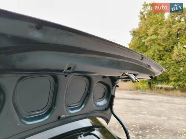 Дэу Ланос 2003 в Запорожье на Automoto.ua Зеленый Дэу Ланос, объемом двигателя 1.5 л и пробегом 97 тыс. км за 3300 $, фото 12 на Automoto.ua