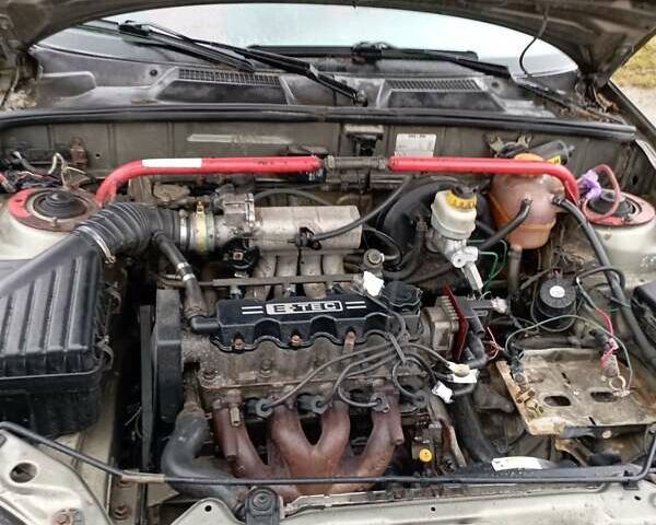 Зеленый Дэу Ланос, объемом двигателя 1.5 л и пробегом 350 тыс. км за 850 $, фото 11 на Automoto.ua