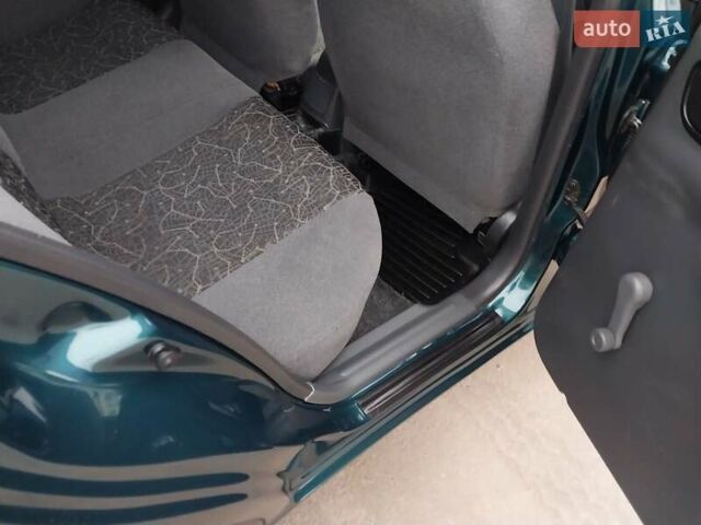 Зелений Деу Ланос, об'ємом двигуна 1.5 л та пробігом 178 тис. км за 3100 $, фото 29 на Automoto.ua