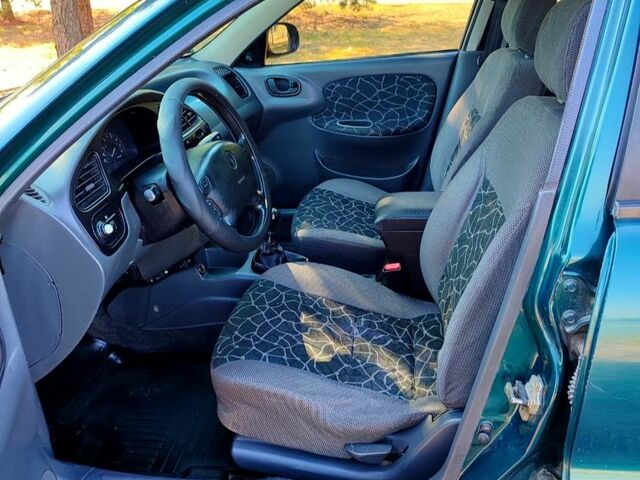 Зеленый Дэу Ланос, объемом двигателя 1.5 л и пробегом 210 тыс. км за 2650 $, фото 6 на Automoto.ua