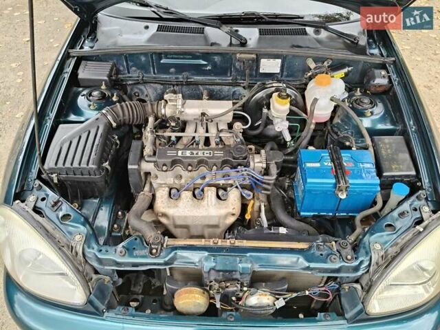 Дэу Ланос 2003 в Запорожье на Automoto.ua Зеленый Дэу Ланос, объемом двигателя 1.5 л и пробегом 97 тыс. км за 3300 $, фото 8 на Automoto.ua