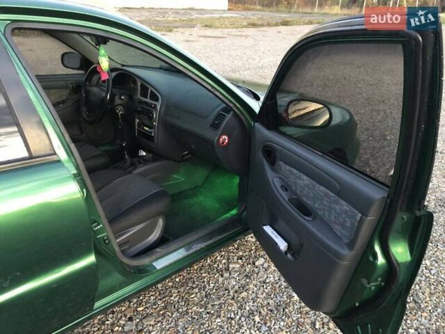 Дэу Ланос 2003 в Виноградове на Automoto.ua Зеленый Дэу Ланос, объемом двигателя 1.6 л и пробегом 255 тыс. км за 3350 $, фото 5 на Automoto.ua