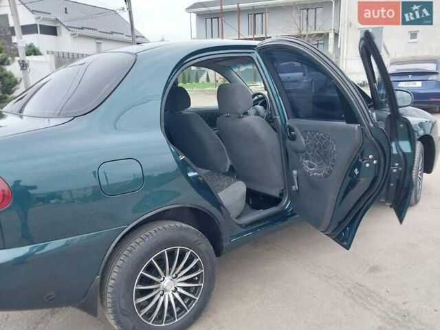 Зелений Деу Ланос, об'ємом двигуна 1.5 л та пробігом 178 тис. км за 3100 $, фото 28 на Automoto.ua