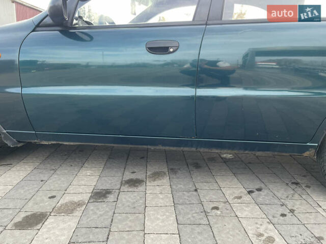 Зеленый Дэу Ланос, объемом двигателя 1.5 л и пробегом 310 тыс. км за 1300 $, фото 11 на Automoto.ua