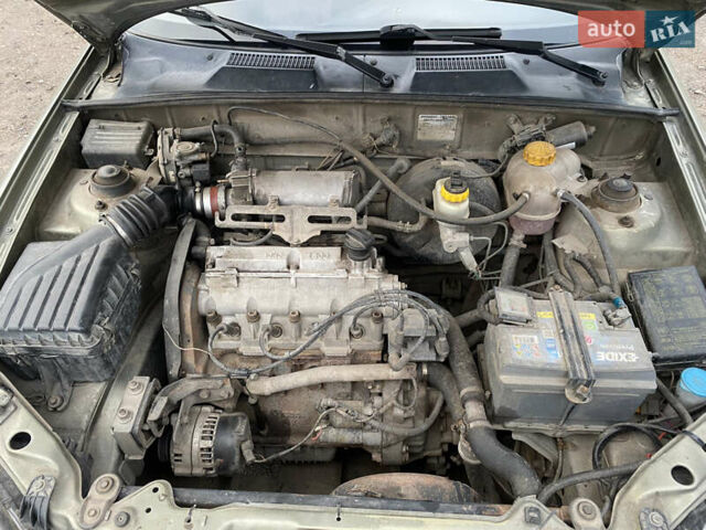 Зеленый Дэу Ланос, объемом двигателя 1.35 л и пробегом 361 тыс. км за 1700 $, фото 12 на Automoto.ua