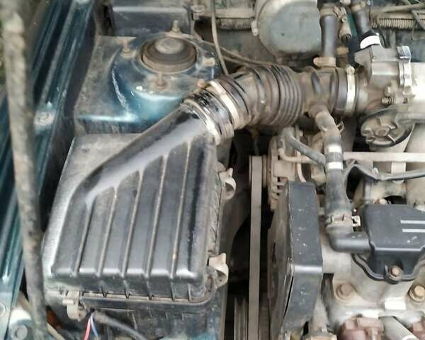 Деу Ланос 2003 у Люботине на Automoto.ua Зелений Деу Ланос, об'ємом двигуна 1.5 л та пробігом 200 тис. км за 2000 $, фото 6 на Automoto.ua