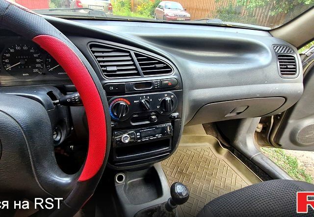 Дэу Ланос 2003 в Славянске на Automoto.ua Зеленый Дэу Ланос, объемом двигателя 1.5 л и пробегом 450 тыс. км за 1100 $, фото 12 на Automoto.ua