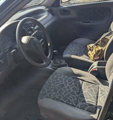 Зелений Деу Ланос, об'ємом двигуна 1.5 л та пробігом 283 тис. км за 1300 $, фото 5 на Automoto.ua