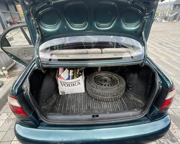 Зеленый Дэу Ланос, объемом двигателя 1.5 л и пробегом 310 тыс. км за 1300 $, фото 17 на Automoto.ua