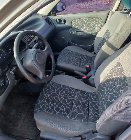 Зеленый Дэу Ланос, объемом двигателя 1.5 л и пробегом 309 тыс. км за 2300 $, фото 5 на Automoto.ua