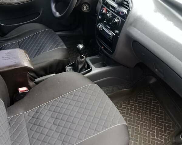 Зеленый Дэу Ланос, объемом двигателя 1.5 л и пробегом 240 тыс. км за 1999 $, фото 10 на Automoto.ua