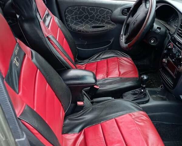 Зеленый Дэу Ланос, объемом двигателя 1.5 л и пробегом 350 тыс. км за 850 $, фото 8 на Automoto.ua