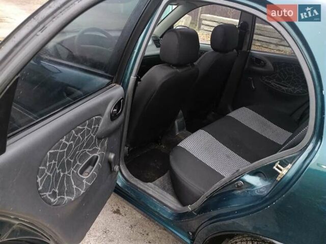 Зеленый Дэу Ланос, объемом двигателя 1.6 л и пробегом 278 тыс. км за 2200 $, фото 5 на Automoto.ua