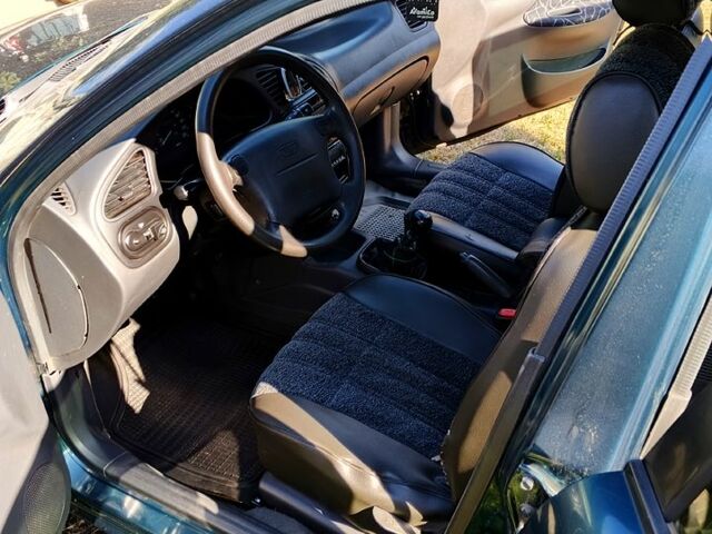 Зеленый Дэу Ланос, объемом двигателя 1.6 л и пробегом 450 тыс. км за 3000 $, фото 11 на Automoto.ua