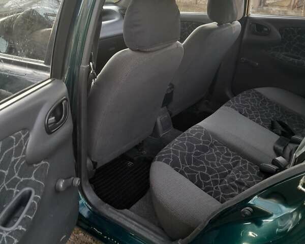 Зеленый Дэу Ланос, объемом двигателя 1.5 л и пробегом 280 тыс. км за 1350 $, фото 3 на Automoto.ua