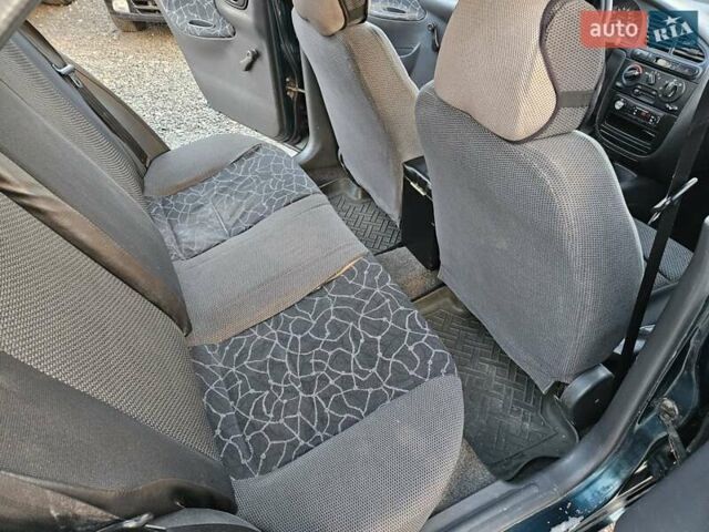 Зеленый Дэу Ланос, объемом двигателя 1.5 л и пробегом 296 тыс. км за 3000 $, фото 13 на Automoto.ua