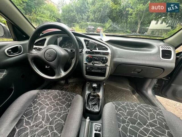 Зеленый Дэу Ланос, объемом двигателя 1.5 л и пробегом 242 тыс. км за 2000 $, фото 7 на Automoto.ua