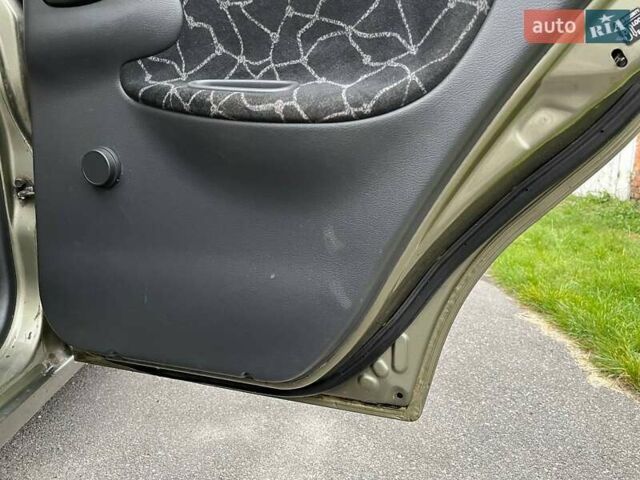 Дэу Ланос 2003 в Виннице на Automoto.ua Зеленый Дэу Ланос, объемом двигателя 1.5 л и пробегом 302 тыс. км за 2400 $, фото 16 на Automoto.ua