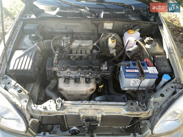 Зеленый Дэу Ланос, объемом двигателя 1.5 л и пробегом 259 тыс. км за 2500 $, фото 7 на Automoto.ua