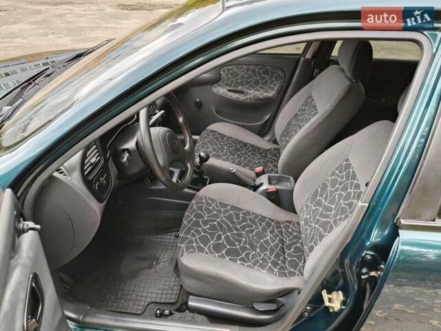 Дэу Ланос 2003 в Запорожье на Automoto.ua Зеленый Дэу Ланос, объемом двигателя 1.5 л и пробегом 97 тыс. км за 3300 $, фото 3 на Automoto.ua