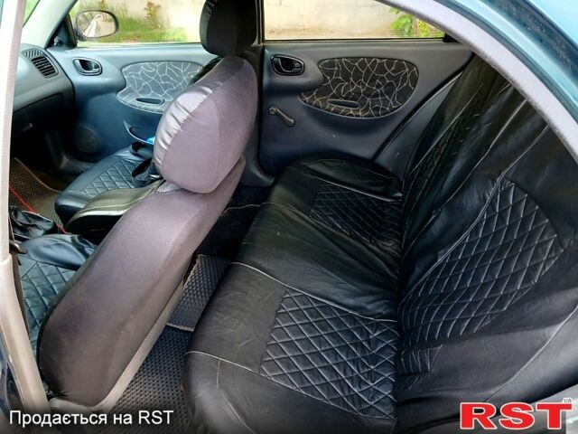 Зелений Деу Ланос, об'ємом двигуна 1.6 л та пробігом 240 тис. км за 1499 $, фото 2 на Automoto.ua