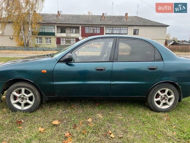 Дэу Ланос 2003 в Репке на Automoto.ua Зеленый Дэу Ланос, объемом двигателя 1.5 л и пробегом 250 тыс. км за 1800 $, фото 7 на Automoto.ua