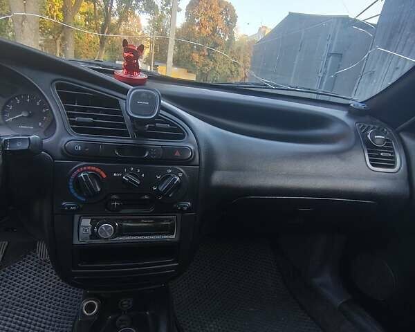 Зелений Деу Ланос, об'ємом двигуна 1.6 л та пробігом 328 тис. км за 2300 $, фото 4 на Automoto.ua