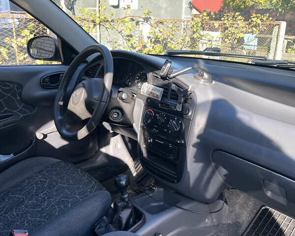 Зеленый Дэу Ланос, объемом двигателя 1.5 л и пробегом 259 тыс. км за 2500 $, фото 4 на Automoto.ua