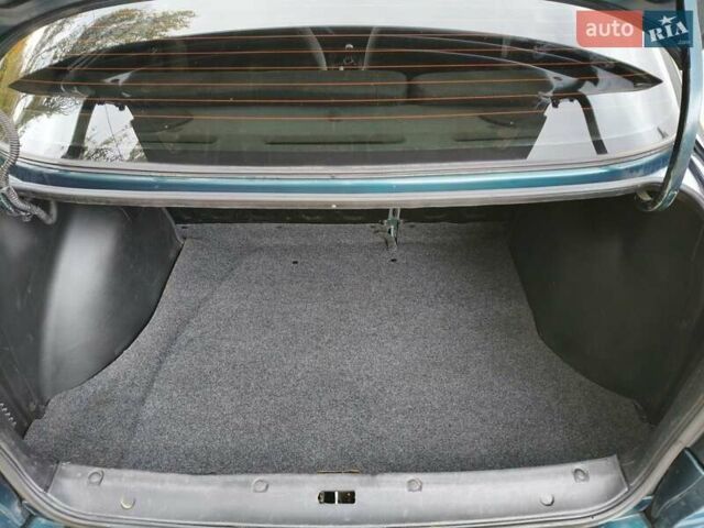 Дэу Ланос 2003 в Запорожье на Automoto.ua Зеленый Дэу Ланос, объемом двигателя 1.5 л и пробегом 97 тыс. км за 3300 $, фото 15 на Automoto.ua