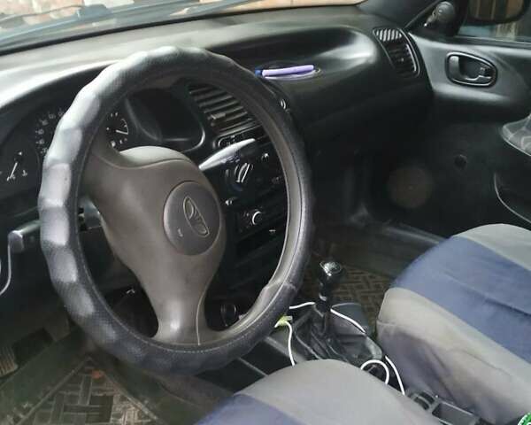 Деу Ланос 2003 у Люботине на Automoto.ua Зелений Деу Ланос, об'ємом двигуна 1.5 л та пробігом 200 тис. км за 2000 $, фото 2 на Automoto.ua