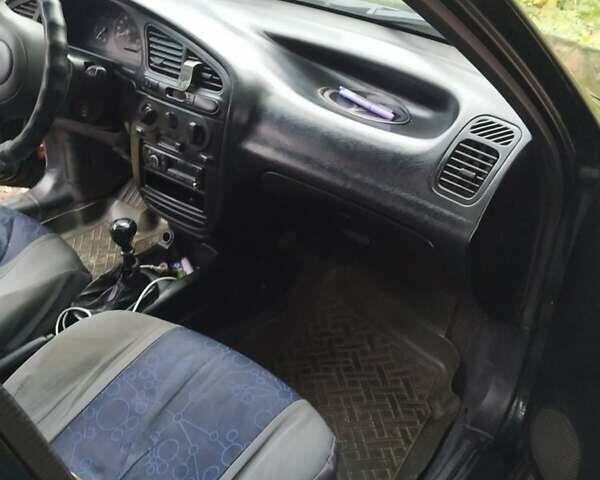 Деу Ланос 2003 у Люботине на Automoto.ua Зелений Деу Ланос, об'ємом двигуна 1.5 л та пробігом 200 тис. км за 2000 $, фото 3 на Automoto.ua