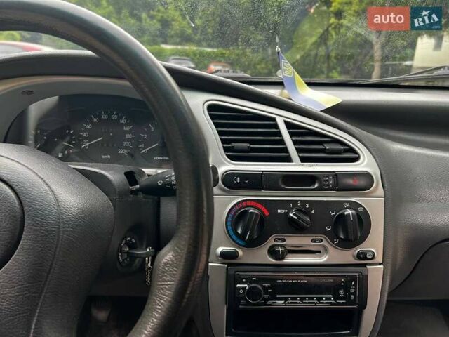 Зеленый Дэу Ланос, объемом двигателя 1.5 л и пробегом 242 тыс. км за 2000 $, фото 9 на Automoto.ua