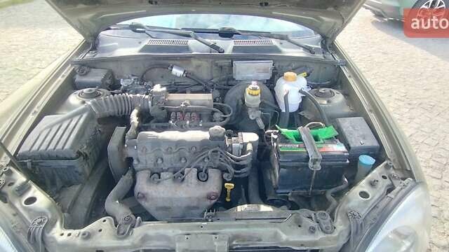 Дэу Ланос 2003 в Киеве на Automoto.ua Зеленый Дэу Ланос, объемом двигателя 1.5 л и пробегом 276 тыс. км за 1500 $, фото 25 на Automoto.ua