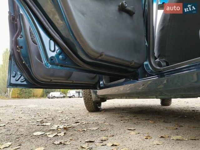 Дэу Ланос 2003 в Запорожье на Automoto.ua Зеленый Дэу Ланос, объемом двигателя 1.5 л и пробегом 97 тыс. км за 3300 $, фото 13 на Automoto.ua