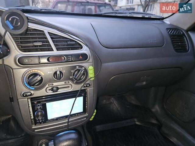 Зелений Деу Ланос, об'ємом двигуна 1.6 л та пробігом 150 тис. км за 3050 $, фото 11 на Automoto.ua