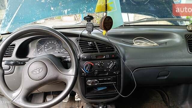 Дэу Ланос 2003 в Вознесенске на Automoto.ua Зеленый Дэу Ланос, объемом двигателя 1.5 л и пробегом 290 тыс. км за 2400 $, фото 4 на Automoto.ua