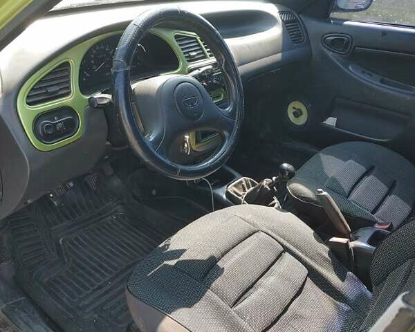 Зеленый Дэу Ланос, объемом двигателя 1.6 л и пробегом 230 тыс. км за 1399 $, фото 11 на Automoto.ua