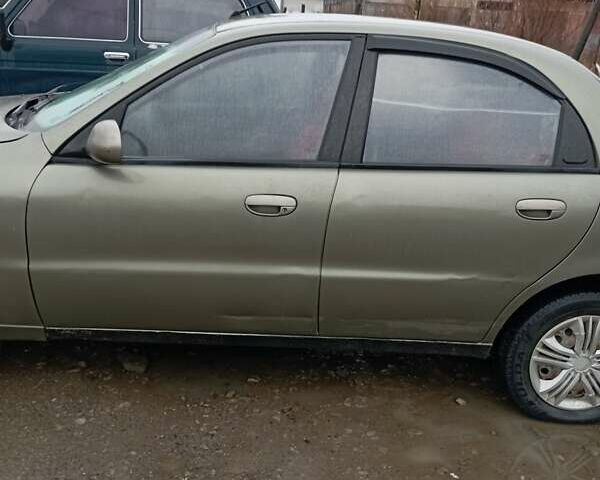 Зеленый Дэу Ланос, объемом двигателя 1.5 л и пробегом 350 тыс. км за 850 $, фото 4 на Automoto.ua