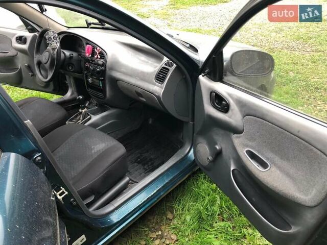 Зеленый Дэу Ланос, объемом двигателя 1.5 л и пробегом 208 тыс. км за 1900 $, фото 8 на Automoto.ua