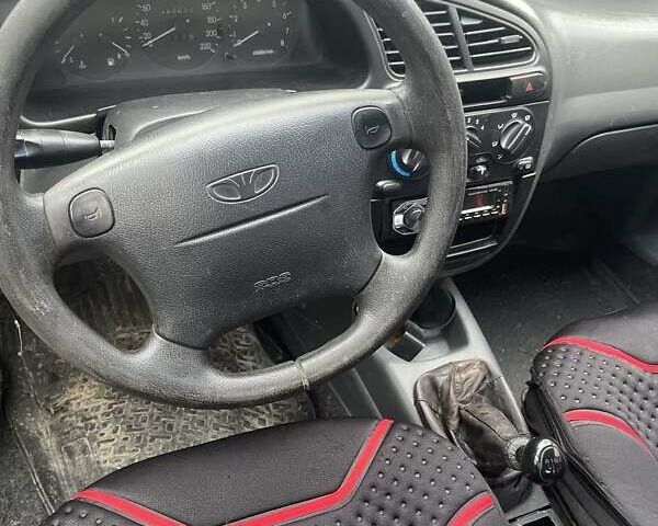 Зеленый Дэу Ланос, объемом двигателя 1.6 л и пробегом 200 тыс. км за 850 $, фото 4 на Automoto.ua