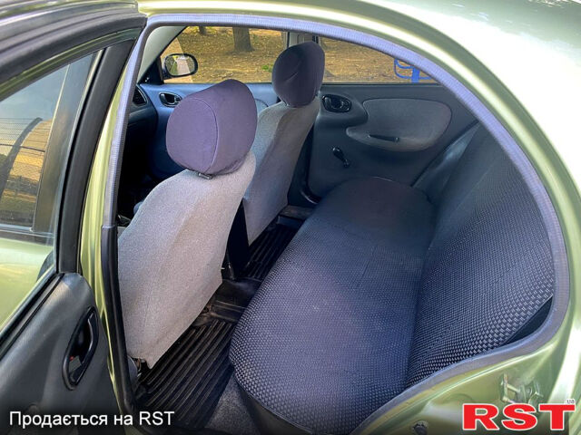 Зелений Деу Ланос, об'ємом двигуна 1.5 л та пробігом 300 тис. км за 1999 $, фото 12 на Automoto.ua