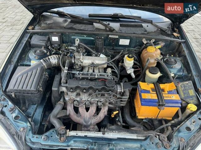 Зеленый Дэу Ланос, объемом двигателя 1.5 л и пробегом 220 тыс. км за 1660 $, фото 9 на Automoto.ua