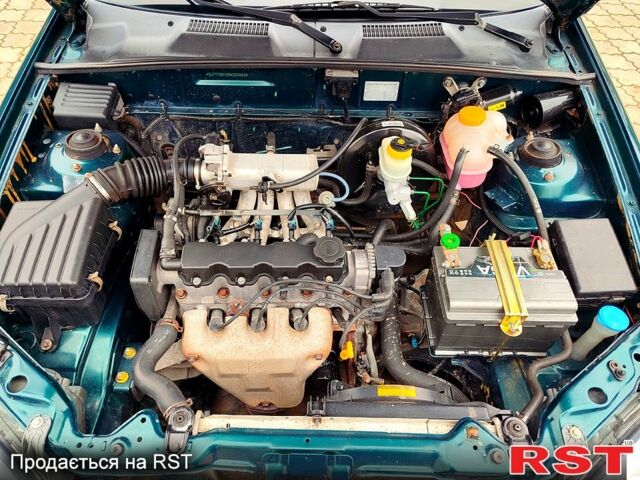 Зеленый Дэу Ланос, объемом двигателя 1.5 л и пробегом 185 тыс. км за 2750 $, фото 9 на Automoto.ua