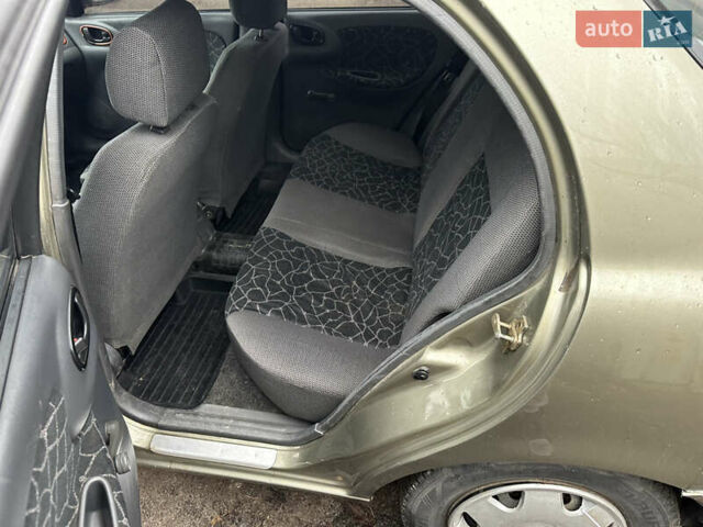 Зеленый Дэу Ланос, объемом двигателя 1.5 л и пробегом 250 тыс. км за 2000 $, фото 7 на Automoto.ua