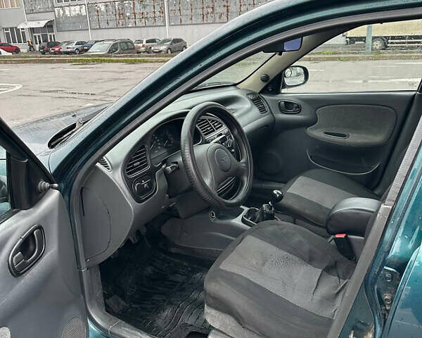 Зелений Деу Ланос, об'ємом двигуна 1.5 л та пробігом 256 тис. км за 1950 $, фото 8 на Automoto.ua