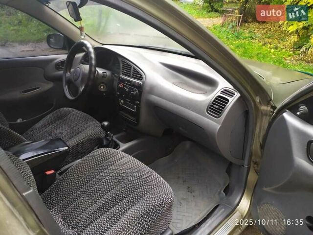 Деу Ланос 2004 у Умани на Automoto.ua Зелений Деу Ланос, об'ємом двигуна 1.5 л та пробігом 300 тис. км за 2300 $, фото 5 на Automoto.ua
