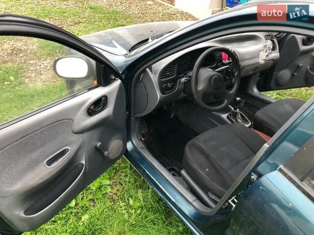 Зеленый Дэу Ланос, объемом двигателя 1.5 л и пробегом 208 тыс. км за 1900 $, фото 7 на Automoto.ua