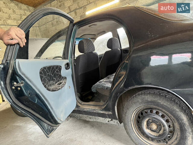 Зеленый Дэу Ланос, объемом двигателя 1.5 л и пробегом 104 тыс. км за 1850 $, фото 4 на Automoto.ua