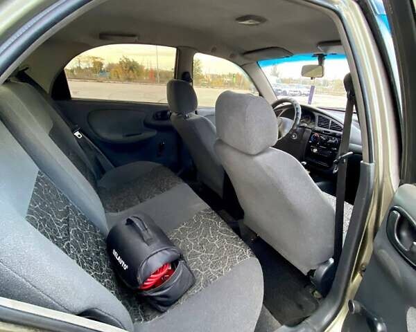 Зелений Деу Ланос, об'ємом двигуна 1.5 л та пробігом 257 тис. км за 2400 $, фото 11 на Automoto.ua